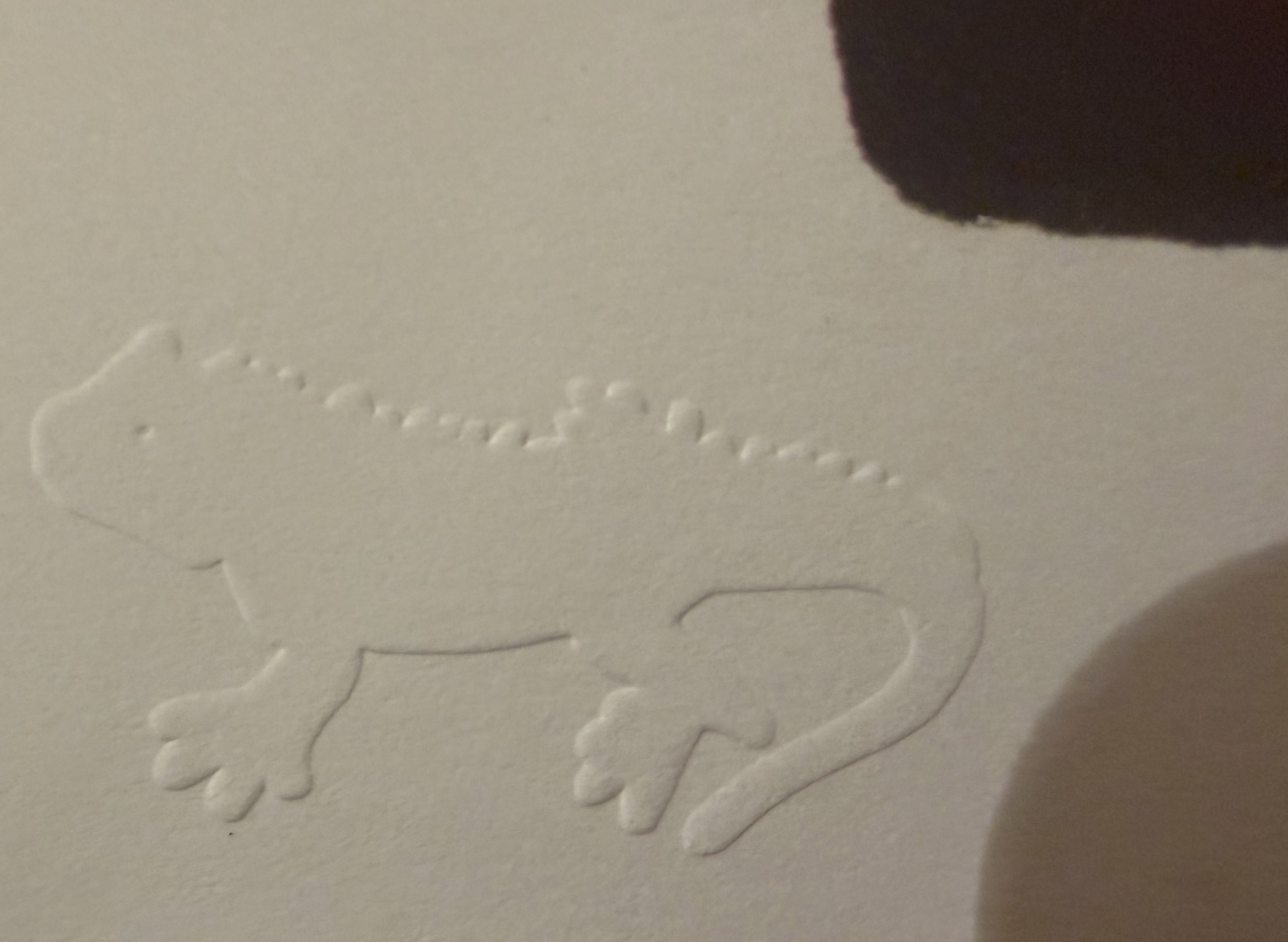 Keith Haring, Pop Shop III (D - Scissors), detail of the embossed iguana blindstamp